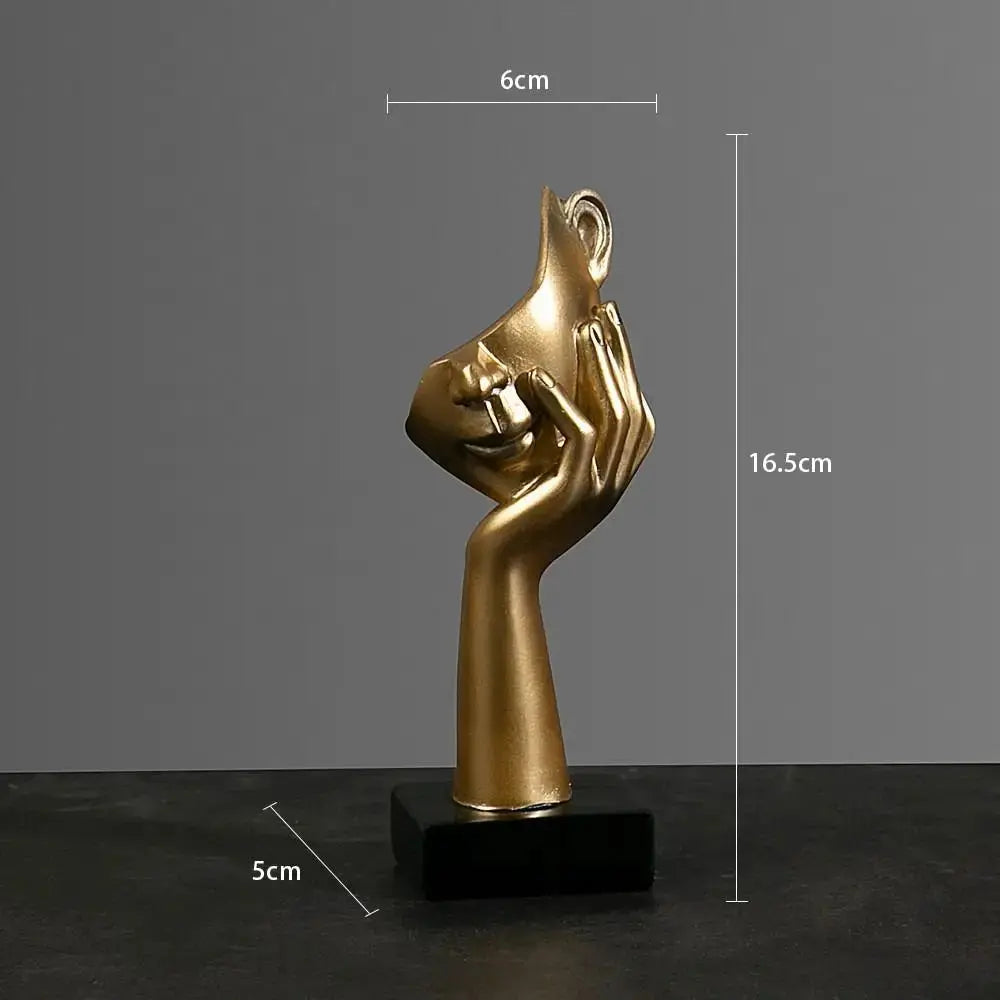 Figur als Gesicht in Gold