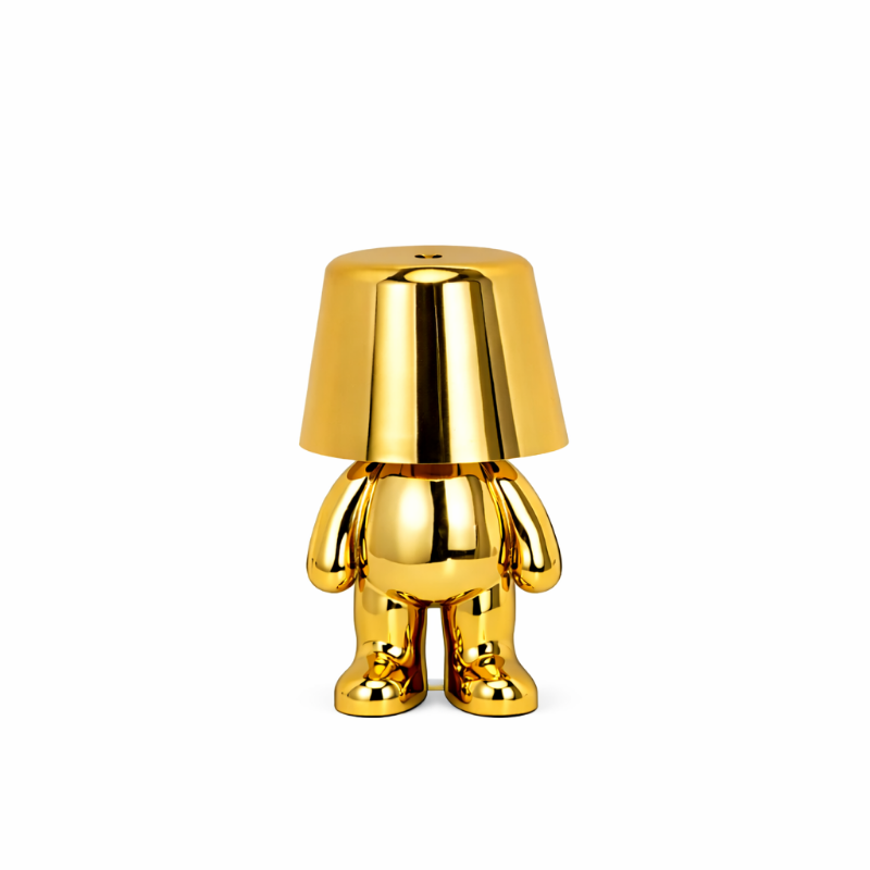 Goldene Figur als Tischlampe